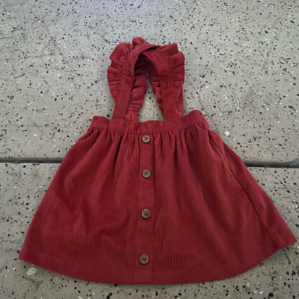 Super cute over the top of a shirt, this is basically like a dress.